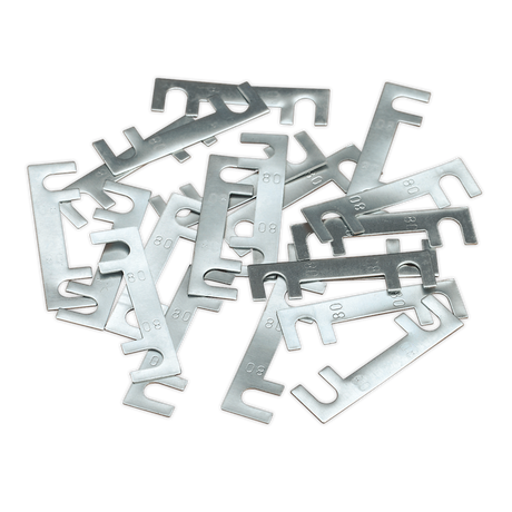 A pile of flat, metallic tools with cut-out slots and hooks, resembling shims or spacers, alongside a Fuse 80Amp 40 x 11mm Pack of 20 - 120/802260 from Sealey.