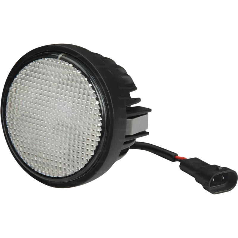 The Sparex Fendt LED Work Light, featuring a black casing, reflective surface, and an attached black cable with a connector, offers exceptional durability with its IP6K9K rating and emits 2200 lumens of raw light at 10-30V, classified under Interference Class 3.