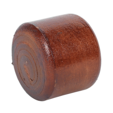 A small, cylindrical block of wood with a smooth, polished surface and a circular grain pattern on the top, ideal for professional use or as a replacement piece for Sealey's Rawhide Hammer Face for CRF35 - 342/14R.
