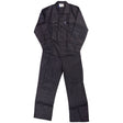 The Draper Boiler Suit, Medium - BS2, in black, features long sleeves, a folded collar, buttoned chest pockets, dual side pockets, and an elasticated back. It is displayed against a plain background.