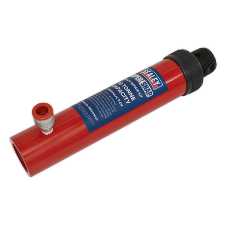 The Sealey Push Ram - 10tonne - 610/41 features a red hydraulic jack cylinder with a black threaded end and a small metal valve, making it ideal for heavy loads. The label displays "Sealey" along with the specifications and instructions. It is perfect for use in body repair kits.