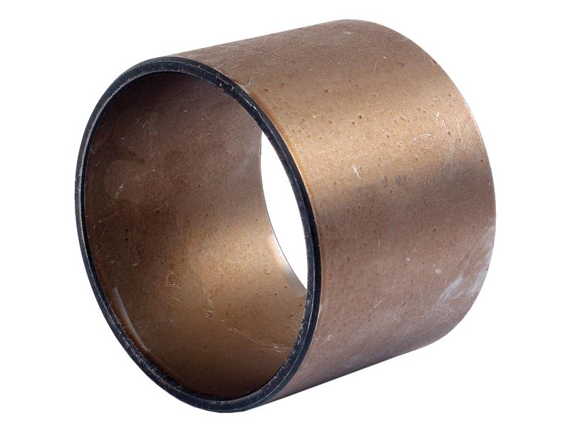 A Spindle Bush (Sparex Part No. S.65075) by Sparex, is a copper-colored cylindrical bushing with smooth interior and exterior surfaces, designed for mechanical applications such as the front axle sleeve of an International Harvester.