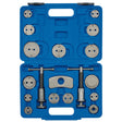 The Draper Expert Brake Caliper Piston Wind-Back Kit (18 Piece) - CWBT18B, a blue plastic storage case containing various metal automotive brake caliper piston rewind tools and adapters, organized in specific slots, is perfect for DIY mechanics working on replacement brake pads.