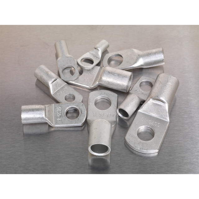 The Copper Lug Terminal Assortment 52pc - AB016CT from Sealey is neatly arranged on a flat, metallic surface.