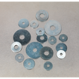 A group of variously sized metal washers, including the Sealey Repair Washer Assortment 240pc M5-M10 Metric Zinc Plated (AB059RW), arranged on a flat surface.