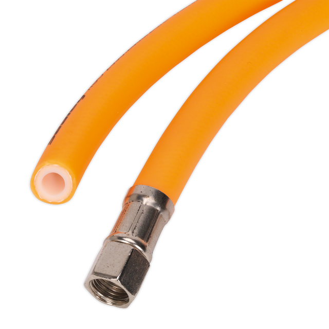 Two high-visibility yellow flexible hoses are shown. One, a Sealey Air Hose 10m x Ø10mm Hybrid High-Visibility with 1/4"BSP Unions (AHHC1038), made from a PVC and rubber blend, has a metal connector at the end, while the other is open with a view of the inner lining.