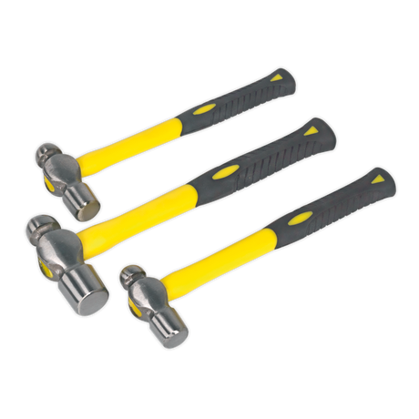 The Ball Pein Hammer Set 3pc with Fibreglass Shafts by Sealey, crafted from high-quality drop-forged steel, features yellow and black hammers of varying head types and sizes, arranged parallel to each other like a professional engineer's set.