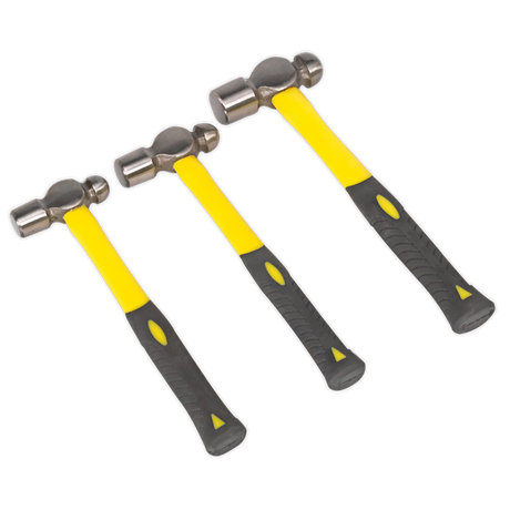 Three Sealey Ball Pein Hammers from the AK2031 set, featuring ergonomic yellow fibreglass shafts and black grips, crafted from high-quality drop-forged steel, aligned side by side.