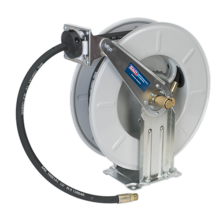 The Sealey Oil Hose Reel Retractable 10m - AK4567D features a black hose and metal bracket, is mounted on a heavy-duty steel stand, and includes a multi-position ratchet lock.
