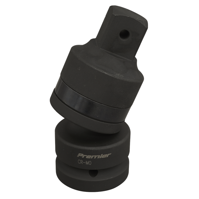 Introducing the Sealey Impact Universal Joint 1"Sq Drive - AK5499, a black, cylindrical mechanical tool inscribed with "Sealey." It features a slightly angled upper segment and a square hole with notches on top. Known for its outstanding corrosion resistance, this air impact tool is built for durability and precision.