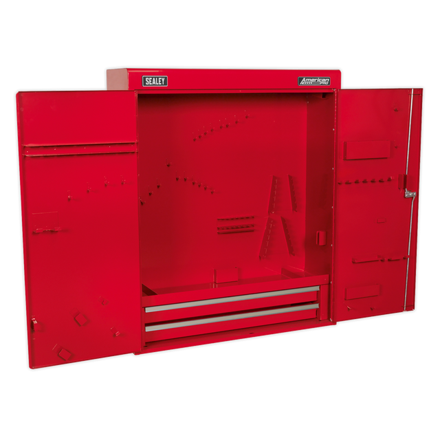 Sealey Wall Mounting Tool Cabinet - APW750 features double, lockable doors crafted from heavy gauge steel. Open to reveal an empty interior with two drawers at the bottom, numerous small holes, and various storage slots.