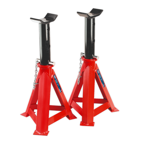 The Sealey Axle Stands (Pair) 12 Tonne Capacity per Stand - AS12000 feature two red and black steel stands with triangular bases and adjustable height mechanisms, offering excellent load support and designed to meet stringent safety standards.