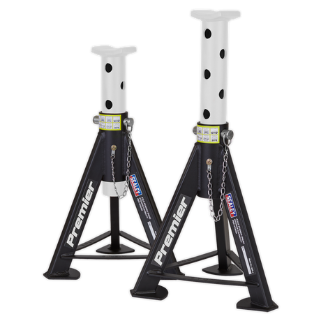 Two welded steel car jack stands labeled "Sealey Axle Stands (Pair) 6 Tonne Capacity per Stand - White," featuring heavy-duty, adjustable columns and safety chains. These stands are designed for maximum stability and reliability.