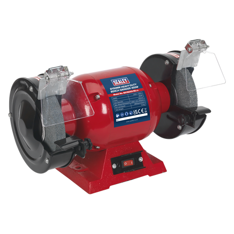 The Sealey Bench Grinder Ø150mm 450W/230V Heavy-Duty - BG150XD/99 features a red and black design, dual aluminous oxide grinding stones, and clear protective shields. It includes an on/off switch at the base, a copper-wound induction motor for improved efficiency, and bears the Sealey brand label on the body—making it ideal for general workshop grinding tasks.