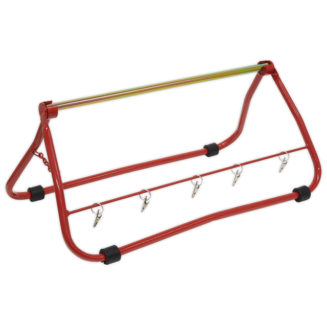 The Sealey Cable Carrier Stand Multi Reel Dispenser - CC01 is a red and black foldable stand with four hooks, ideal for mounting on a vehicle. It includes additional support to efficiently handle wire reels.