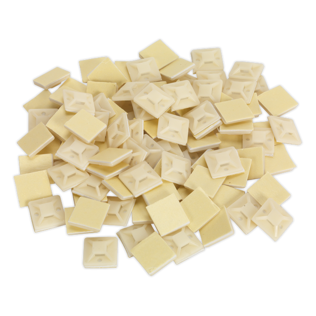 A pack of Sealey Self-Adhesive Cable Tie Mounts, 20 x 20mm in white (Product Code: CTM2020W), designed to accept ties up to 5mm in width, is arranged on a white surface.