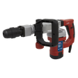 A red and black Demolition Breaker Hammer SDS MAX 1300W/230V - DHB1300 from Sealey, featuring a D-handle grip, an SDS MAX chuck, and a detachable drill bit.