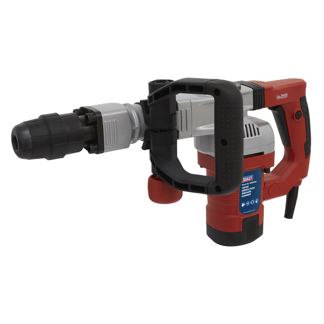 A red and black Demolition Breaker Hammer SDS MAX 1300W/230V - DHB1300 from Sealey, featuring a D-handle grip, an SDS MAX chuck, and a detachable drill bit.
