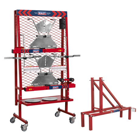 The Sealey 4-Wheel Laser Wheel Aligner Combo - GA70COMBO features a red metal framework holding two metal cone-shaped containers and is equipped with a matching red structure on wheels. The aligner, which significantly enhances vehicle performance, prominently displays the Sealey logo on both the top and middle of the framework.