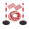 Two red and white striped stanchions from the Sealey Exclusion Zone Extension Kit - HP55KECOMBO, connected by a safety chain with plastic chain connectors, are arranged against a plain background.