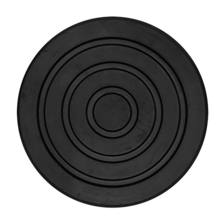 The Sealey Safety Rubber Jack Pad - Type A - JP04 is a black round rubber mat featuring concentric circles, perfect for use with a jack saddle or a Type A design vehicle jacking point.