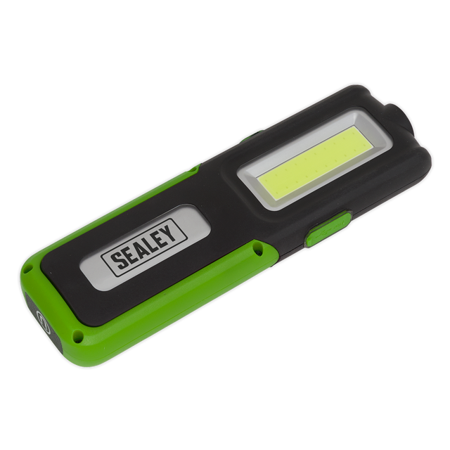 A Sealey Rechargeable Inspection Light, model LED318G, in black and green, featuring a rectangular shape, a side clip, and a super bright 5W COB LED light with an additional 3W SMD LED and power bank functionality—perfect for any task.