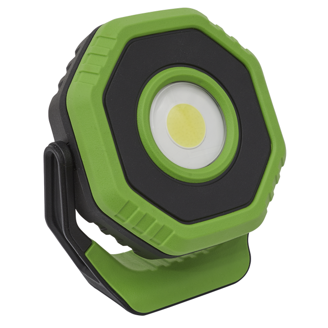 Sealey's Rechargeable Pocket Floodlight with Magnet 360° 7W COB LED - Green (LED700P) is a compact, green and black portable work light that includes a built-in handle and hook, featuring a central LED light and a durable floodlight powered by a lithium-ion battery, emitting 700 lumens.