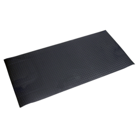 The Sealey Anti-Fatigue Workshop Matting 910 x 1980mm - MCR0919 is a black rubber floor mat featuring a diamond pattern. This rectangular, slip-resistant mat offers cushioned support, ensuring comfort and safety during prolonged standing periods.