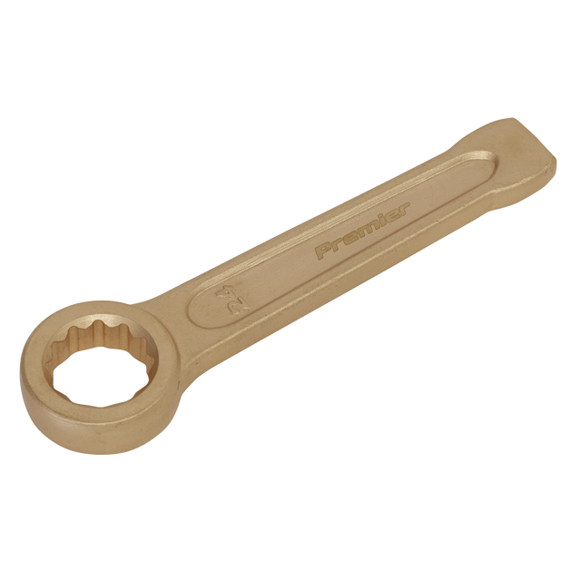 The Sealey Slogging Spanner Ring End 24mm - Non-Sparking - NS029 is a professional-grade tool made from Beryllium Copper, designed with an open ring end and a flat handle. This high-quality wrench features non-sparking properties and is inscribed with "Premier" and "24", making it ideal for professional use in environments where safety is paramount.
