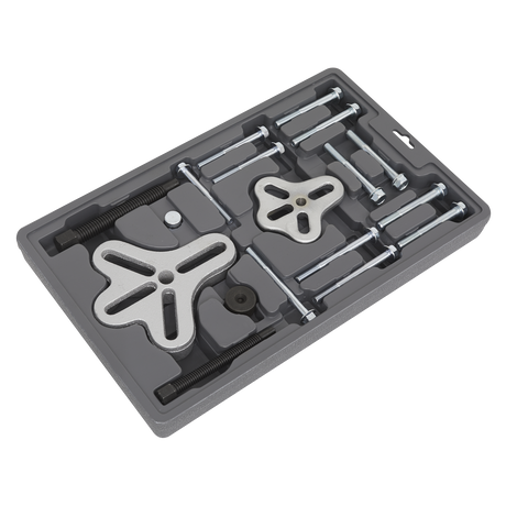 The Sealey Steering Wheel & Harmonic Balancer Puller Set 18pc - PS977 is perfect for working with harmonic balancers and steering wheel yokes, featuring various pullers and bolts neatly organized in a molded plastic case.