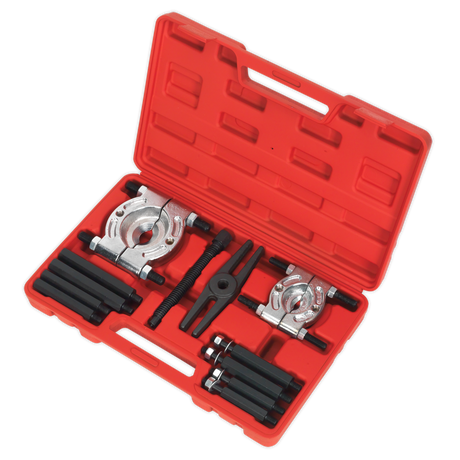 The Sealey Double Mechanical Bearing Separator/Puller Set 12pc - PS984 rests open in its red toolkit case, showcasing Ø25-50mm separators and a 170mm thrust bolt, all neatly organized in foam compartments.