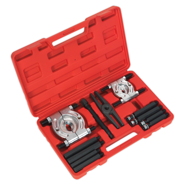 A Double Mechanical Bearing Separator/Puller Set 12pc (PS984) by Sealey comes in a red plastic case and includes Ø25-50mm separators, a 170mm thrust bolt, metal separators, a hexagonal puller, screws, and rods.