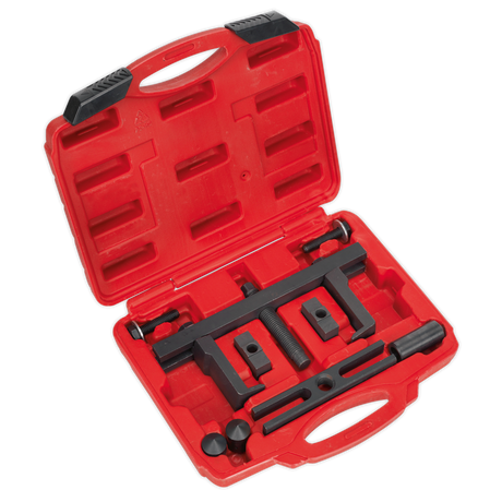 The Sealey Crankshaft Pulley Removal Tool Set 12pc - PS997 is a red plastic carrying case containing a variety of specialized black metal components for crankshaft pulleys removal.