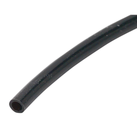 Close-up image of Sealey Polyethylene Tubing 6mm x 100m Black (John Guest Speedfit® - PE06040100ME) - PT6100 with a hollow center, shown against a white background.