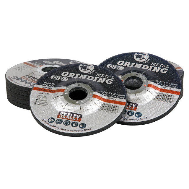 A pack of twelve Sealey grinding discs, each measuring Ø115 x 6mm with a Ø22mm bore, crafted from Aluminium oxide. The discs are arranged in a semi-circle with some lying flat and others slightly elevated, featuring product labels that specify their details. The set also includes a convenient storage case for easy organization and transport. Product code: PTC115G12.