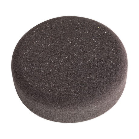 The circular Buffing & Polishing Foam Head Hook-and-Loop Ø150 x 50mm Black/Soft - PTCCHV150P by Sealey features a dark grey premium foam pad with a smooth, slightly textured surface against a transparent background, making it ideal for buffing and polishing.