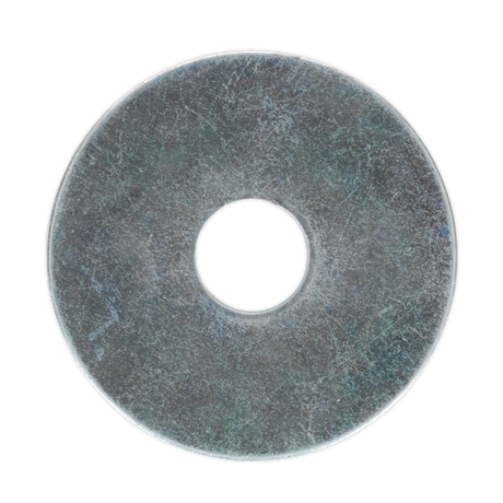 A worn and slightly rusted metal washer, likely from the Sealey Repair Washer M10 x 38mm Zinc Plated Pack of 50 (RW1038), with a circular hole in the center, used for distributing the load of a threaded fastener.