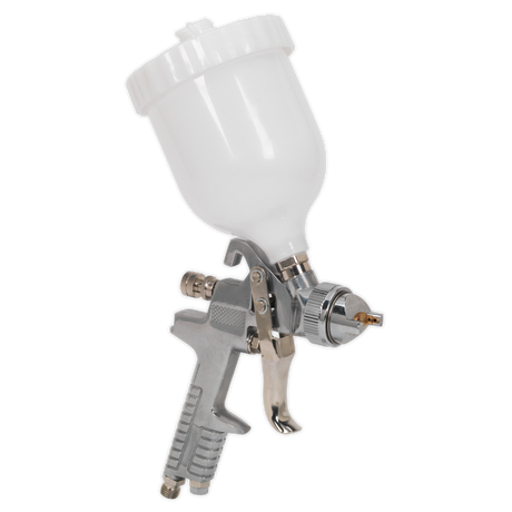 The Spray Gun Gravity Feed - 1.4mm Set-Up - S641G by Sealey features a white paint container mounted on top and comes equipped with a durable metallic grip and nozzle, providing versatile spray patterns suitable for various projects.