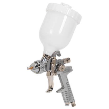 The Spray Gun Gravity Feed - 1.8mm Set-Up (S642G) by Sealey is a silver and white spray gun with an attached paint reservoir, designed with a precision air cap for optimal spray pattern.