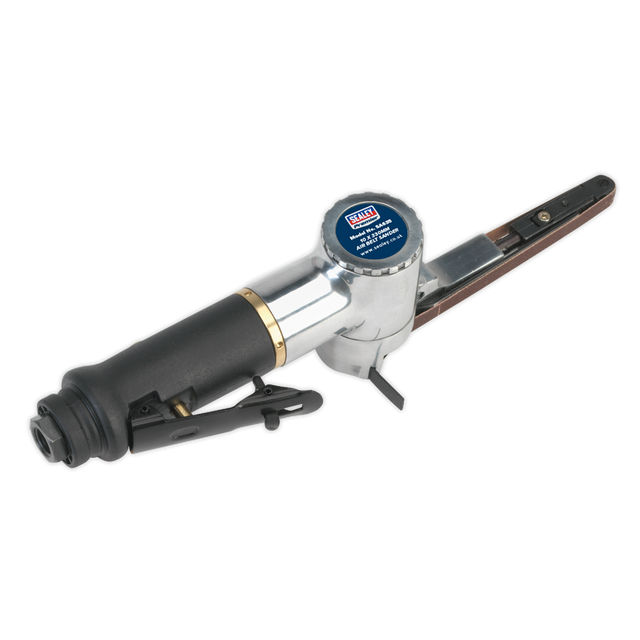 Image of an Air Belt Sander 10 x 330mm - SA635 with a black handle, aluminium housing, and exposed sanding belt. The label on top reads “Sealey” and includes specification details. Notice the sturdy sanding arm that ensures precision during use, making it easy to fit replacement belts when needed.
