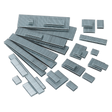 Image depicting multiple rectangular metal slabs, varying in size, arranged in a somewhat scattered manner against a white background, reminiscent of Sealey's 28mm 18SWG staples from the SAAS1828 pack of 5000.