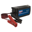 The Sealey Battery Maintainer Charger 12V 15A Fully Automatic - SBC15, featuring black and red clamp cords, is ideal for maintaining 12V batteries.