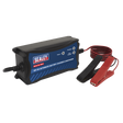 A Sealey SBC4 Battery Maintainer Charger 12V 4A Fully Automatic with black and red alligator clips attached to cords, featuring sulfation repair for improved battery health.