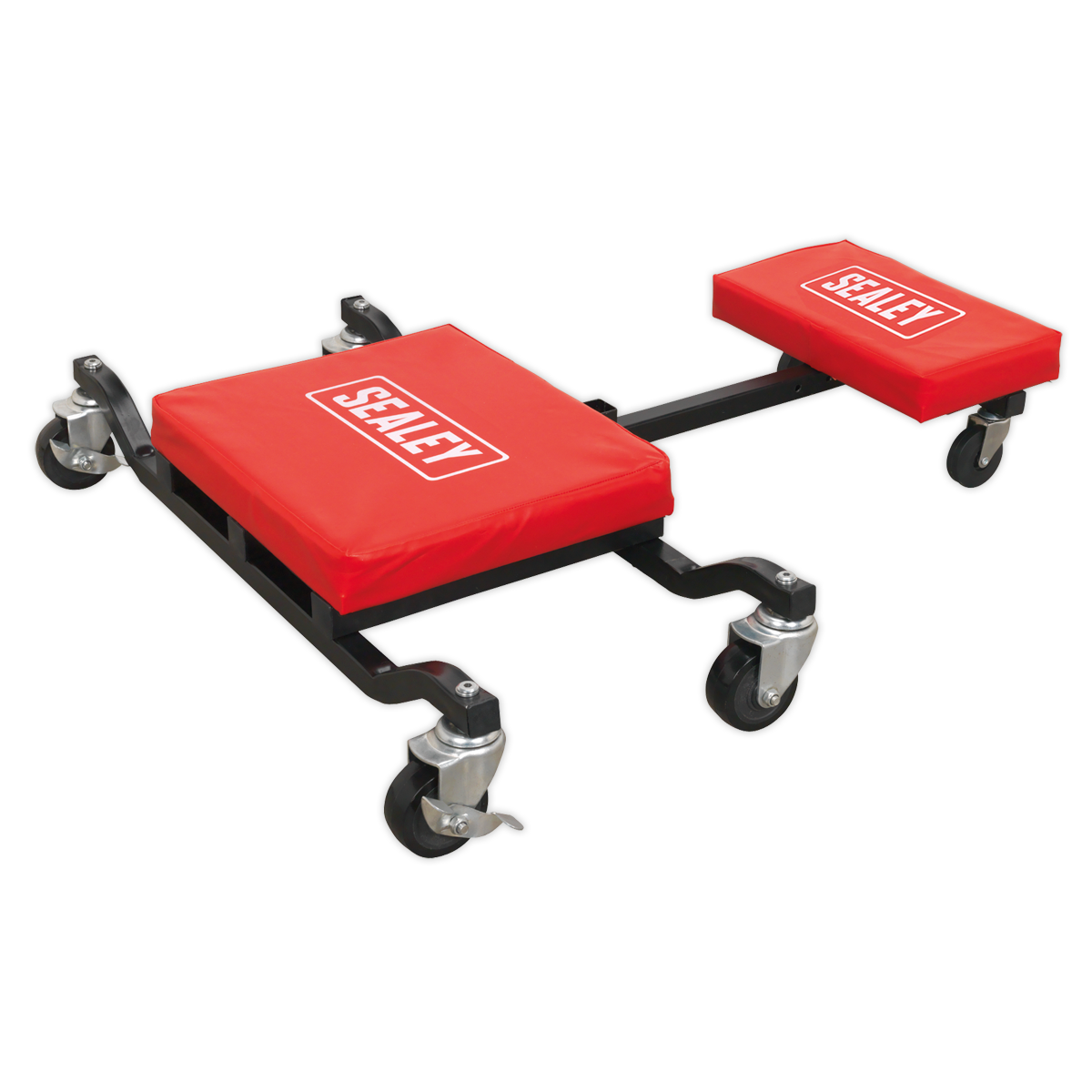 A Sealey Low Level Creeper, Seat & Kneeler - SCR85 features a black metal heavy-duty steel framework with four swiveling caster wheels and red cushioned sections labeled "Sealey." The creeper seat includes a vinyl-covered seat pad for added comfort.