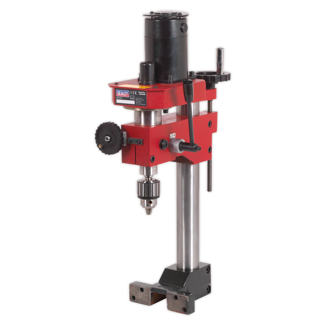 The Sealey Drill Head for Mini Lathe SM2503A - SM2503B, featuring a red and black design with a metal base, adjustable table, and chuck for holding drill bits, excels in various metalworking tasks.