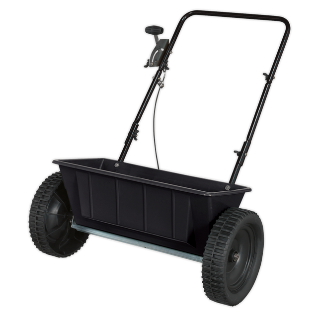 The Sealey Drop Spreader 27kg Walk Behind (SPD27W) is a black, two-wheeled device with a handlebar for pushing and features a rectangular polyethylene dispensing hopper for holding materials.
