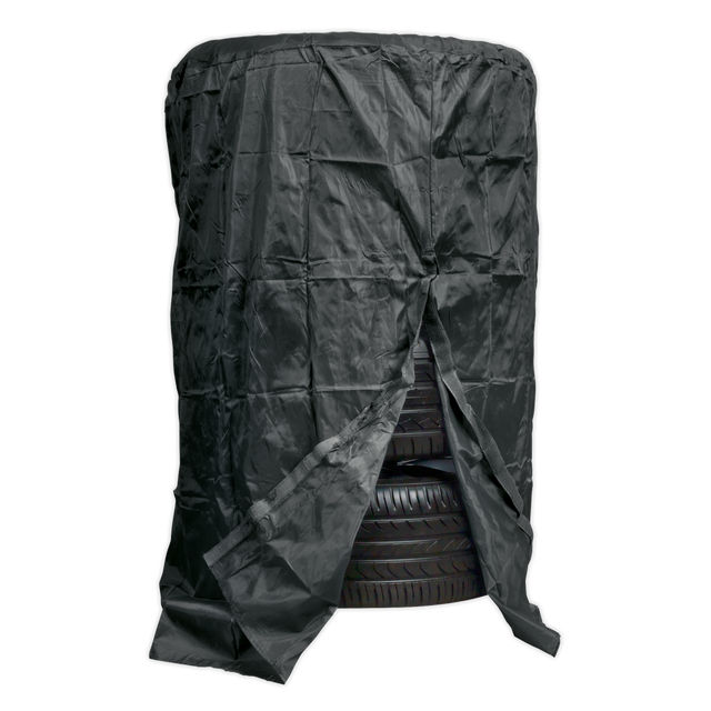 A stack of four car tires covered with a partially open black, water-resistant Sealey Cover for Wheel Storage Trolleys, Model No. STR.C.