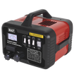 A portable battery charger with a handle, labeled "Sealey," featuring various switches, knobs, and a charging current meter on the front panel. Model number: SUPERBOOST200, 12/24V output for reliable boost power.