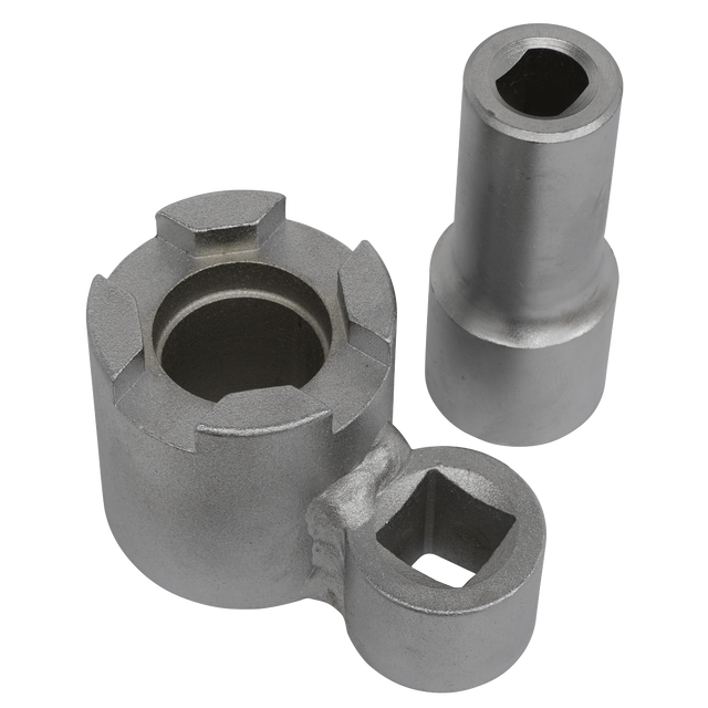 Two metal mechanical components; one is a socket and the other appears to be the Sealey Front Strut Top Nut Holding & Removal Tool - Volvo - SX0332, which has multiple connection points, resembling an OEM tool like a Volvo Strut Tool.