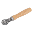 The Patch Stitch Roller - TST15 by Sealey features a wooden handle and a metal circular blade, perfect for ensuring smooth slices every time.
